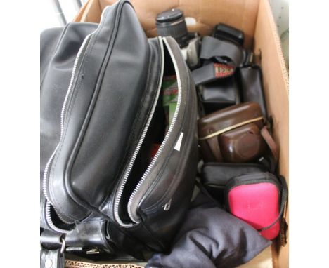 A box containing a variety of cameras, including Cannon EOS1000F, Cannon EOS3000N, a vintage Cannon A1, together with a selec
