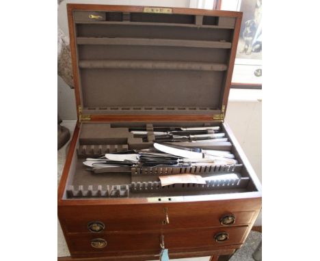 A set of 12 silver handled Mappin and Webb dinner knives, a set of 12 matching silver handled side knives, two pairs of carve