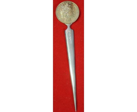 A modern silver letter opener, coin mounted decoration, by Stuart Devlin