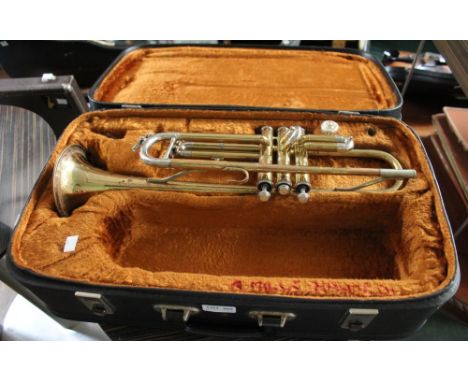 A Kansas Trumpet stamped Rose Morris, London with mouthpiece in hard-shell case
