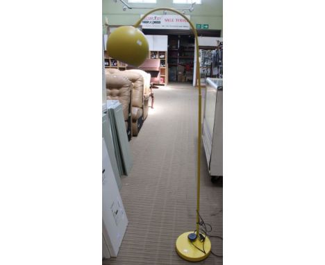 A yellow modern floor standard lamp