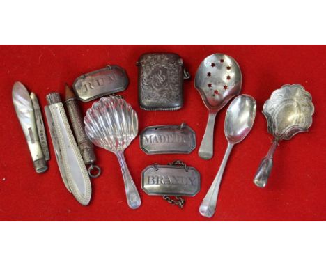 Three Georgian silver bottle labels, silver caddy spoons, etc. gross weighable silver: 41g