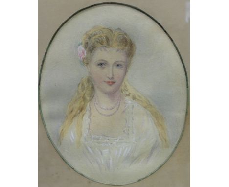 A 19th century European school, portrait of a young woman, flower in her hair, watercolour painting, oval, 28cm x 22cm, frame
