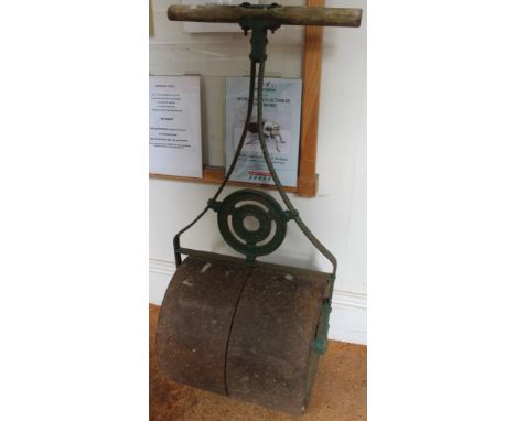 A large vintage garden roller