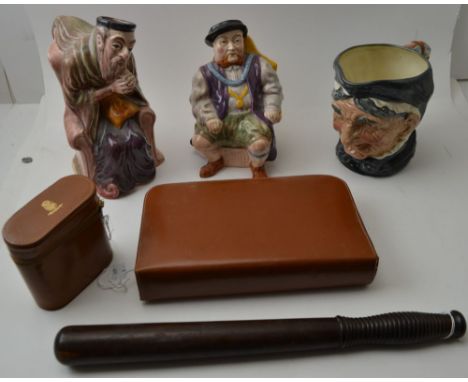 A turned wood truncheon, Three pottery character jugs and vanity cases