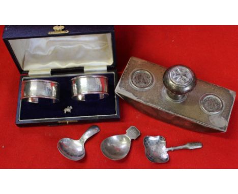 A Maltese silver ink blotter, caddy spoons, and two cased napkin rings, weight of silver caddy spoons: 25g