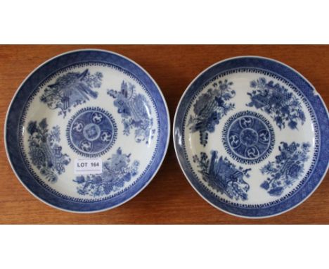 A pair of Chinese late Qianlong porcelain shallow bowls, cobalt blue decoration, 21cm diameter (2) One good, one with cracks 