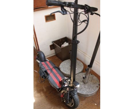 An electric scooter, together with charger