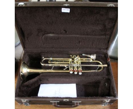 A Getzen 300 series Trumpet with mouthpiece in hard-shell case