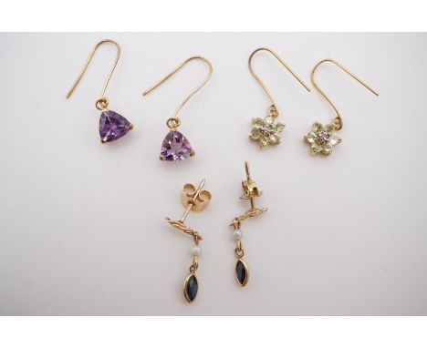 Three pairs of precious gemstone earrings, including a pair of high-carat yellow metal, sapphire and pearl pendant earrings, 