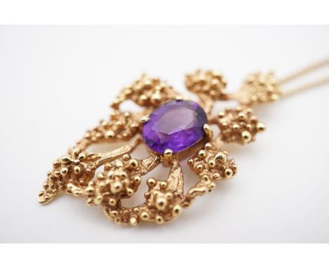 A vintage 9ct gold and amethyst pendant necklace, the oval-cut amethyst of approximately 1.75ct, claw set to the centre of an