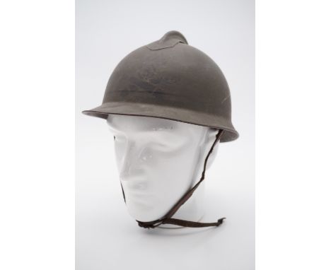 An Italian Adrian Model 1915 helmet bearing stencilled artillery badge
