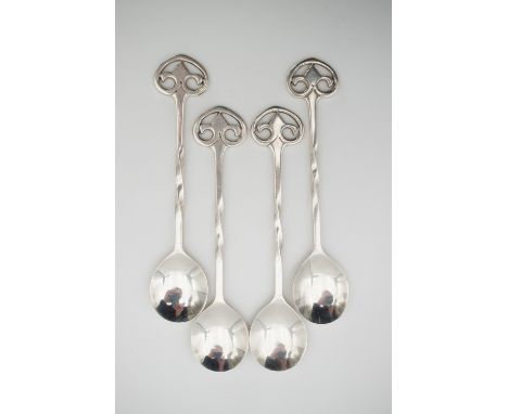 A set of four Keswick School of Industrial Arts silver coffee spoons, having Art Nouveau style open-work terminals and twist 