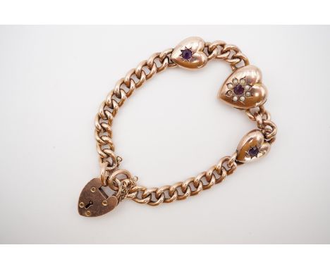 A Belle Epoque 9ct rose gold, amethyst and split seed pearl charm bracelet, of a patented design, having an integral heart-sh