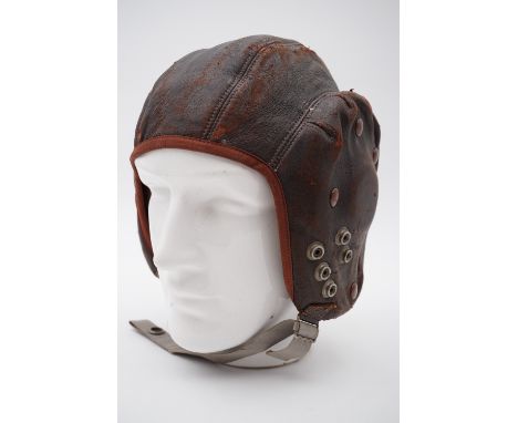 A leather RAF G-type flying helmet