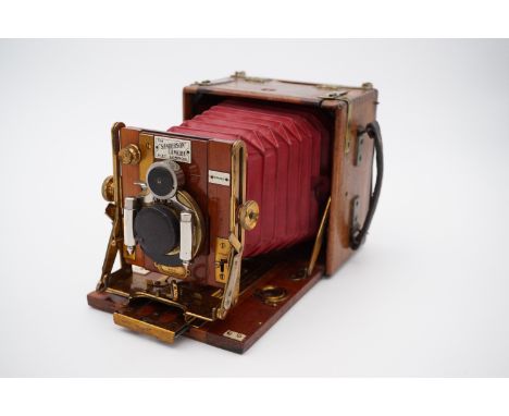 A "The Sanderson" Regular model quarter plate camera with Goertz pat Dopp-Anastigmat Serie III Dagor f=125mm 1:6,8 lens in Ba