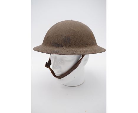 A US Army M-1917 Brodie pattern helmet