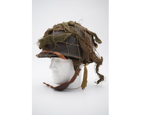 A Second World War US army M1C paratrooper helmet