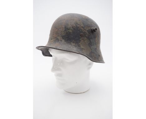 An Imperial German Model 1916 helmet