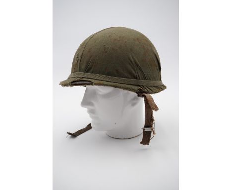 A Falklands War Argentine helmet and cover