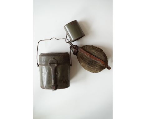 A Great War German army water bottle, mess tins and an enamel cup, each dated 1917