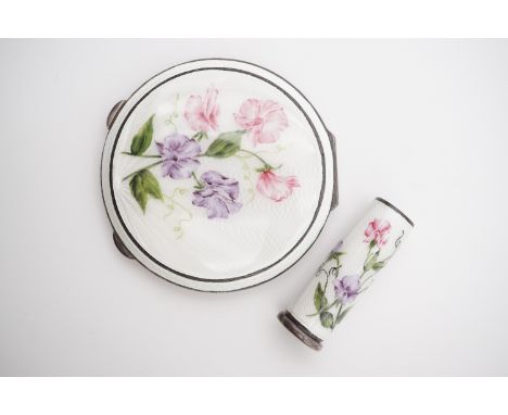 An Elizabeth II guilloche enamelled silver powder compact and matching lipstick holder, hand enamelled with sweet peas, Henry