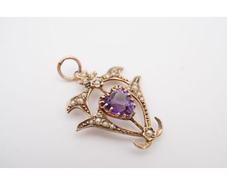 A Belle Epoque Art Nouveau amethyst and split seed pearl sweetheart openwork pendant, having a central heart-shaped faceted a