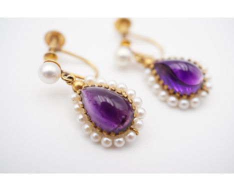 A pair of yellow-metal, amethyst and pearl ear pendants retailed by Hamilton and Inches, each having a central pear-shaped am
