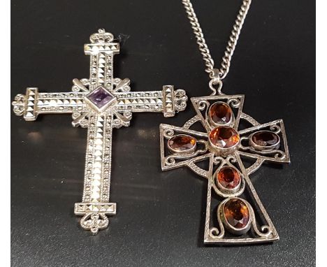 AMETHYST AND MARCASITE SET SILVER CROSS BROOCH7.5cm high; together with a cairngorm set pierced silver cross pendant on chain