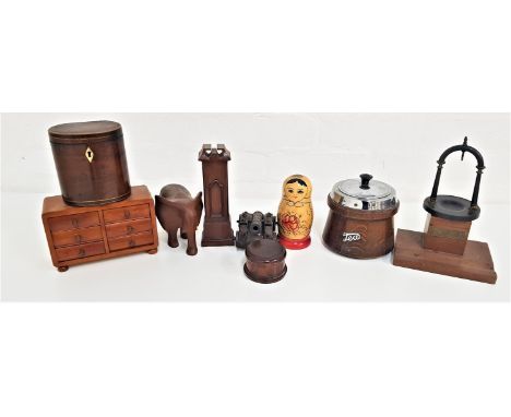 MIXED LOT OF COLLECTABLESincluding a pocket watch stand, Matryoshka doll, oak tea caddy, teak desk stand, teak carved elephan