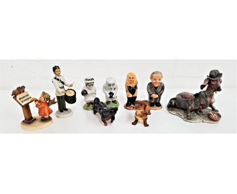 SELECTION OF FIGURINESincluding a Goebel Bird Duet, two Dachshunds, Wedgwood Gurkhas The Drummers, Vicar and Tart salt and pe