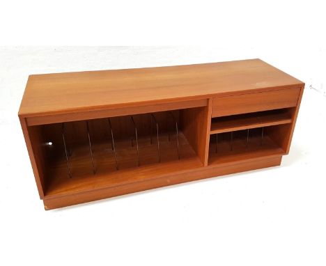 TEAK MUSIC CABINETwith a moulded top above a short drawer with cassette divisions, above an open shelf with 7" single record 