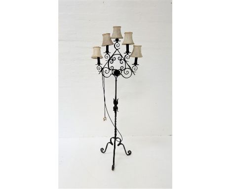 GOTHIC STYLE METAL FLOOR STANDING LAMPraised on a tripod base with a decorative twisted column with leaf decoration, the top 