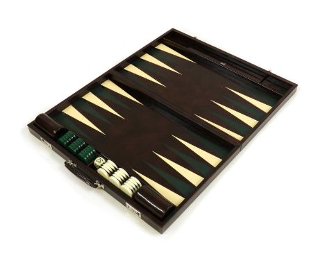 A cased Dunhill backgammon set,the lockable case with green and white counters, within a dust jacket and an outer box, case; 