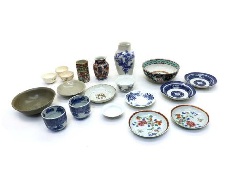 A collection of Chinese and Japanese porcelain,19th to 20th century, comprising: one brush pot, two vases, five cups, a cup, 