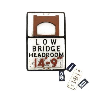 A vintage cast iron 'Low Bridge' sign53cm x 35.5cm, together with another smaller example,reading 'Up Main &amp; Good x Over'
