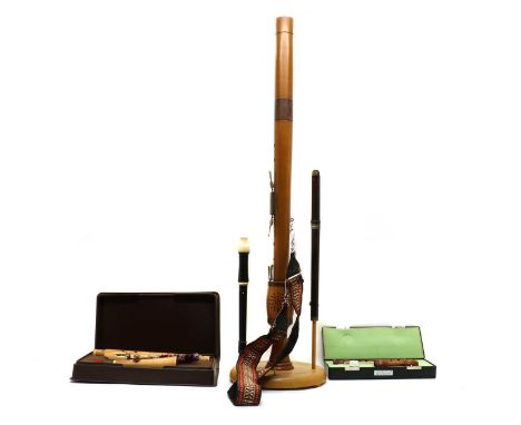 A collection of woodwind instruments, comprising a Moeck bass recorder, 91.5cm long, a Moeck recorder in case, 63.5cm long, a