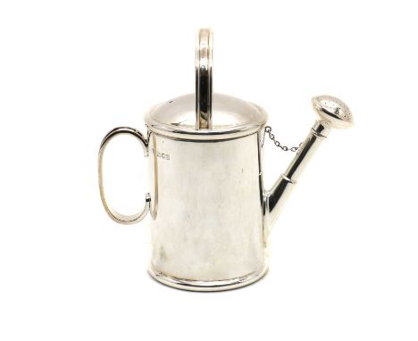 A Garrard &amp; Co novelty silver watering can,London 1995, possibly a milk jug, with a gilt interior,15.5cm high11.9oztSome 