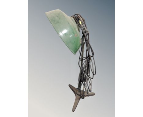 A mid century adjustable angle poise lamp with green enamelled shade 