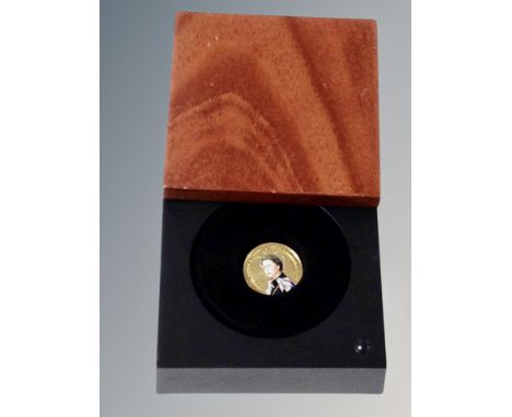 A 9ct golden jubilee enamel coin 