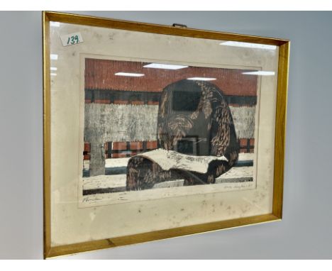 A continental print depicting a figure on a bench, 43 cm x 30 cm 
