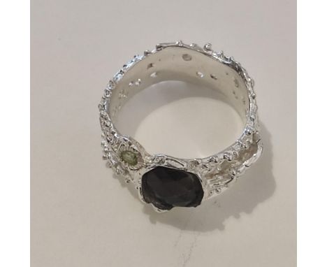 Ethiopian black opal sterling silver white gold plated ring with cubic zirconas. Size Q. 57mm  Circumference. 18.19mm Diamete