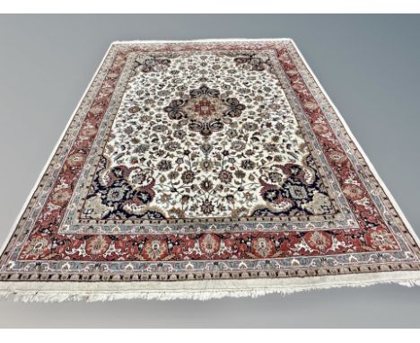 An Isfahan carpet, central Iran, 305cm by 255cm