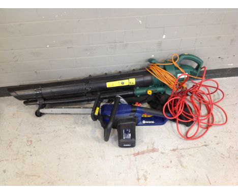 A Spear and Jackson electric chainsaw with blade and chain, together with a garden blower vacuum