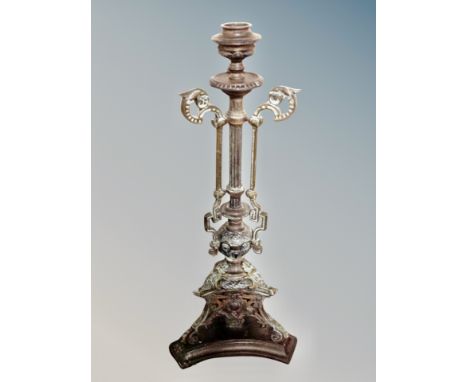 An Arts & Crafts brass decorative candlestick, height 41 cm 