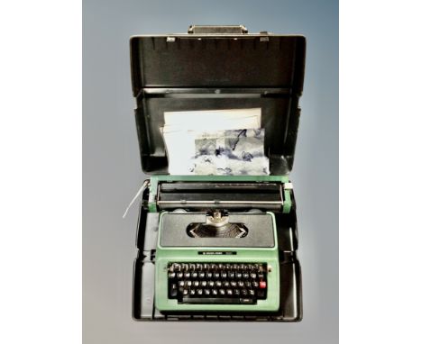 A Silver Reed typewriter in case 