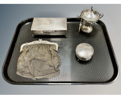 A silver plated oblong box, together with an antique mesh purse, silver lidded ring box and silver plated lidded cup. (4)