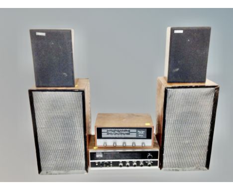 A vintage Rotel solid state stereo receiver RX-150 together with a Wien solid state stereo amplifier, two pairs of speakers 
