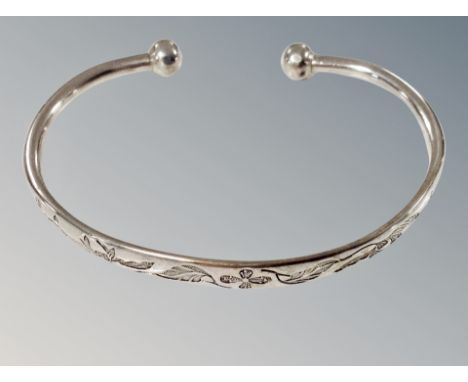 A silver torque bangle 