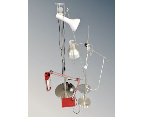 A Luxo adjustable angle poise reading lamp (continental wiring), together with three further floor lamps 